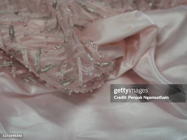 pearl mesh dress pink flower embroidery lace fabric fashion, sequin fabric fashion, string the beads - lace textile stock pictures, royalty-free photos & images