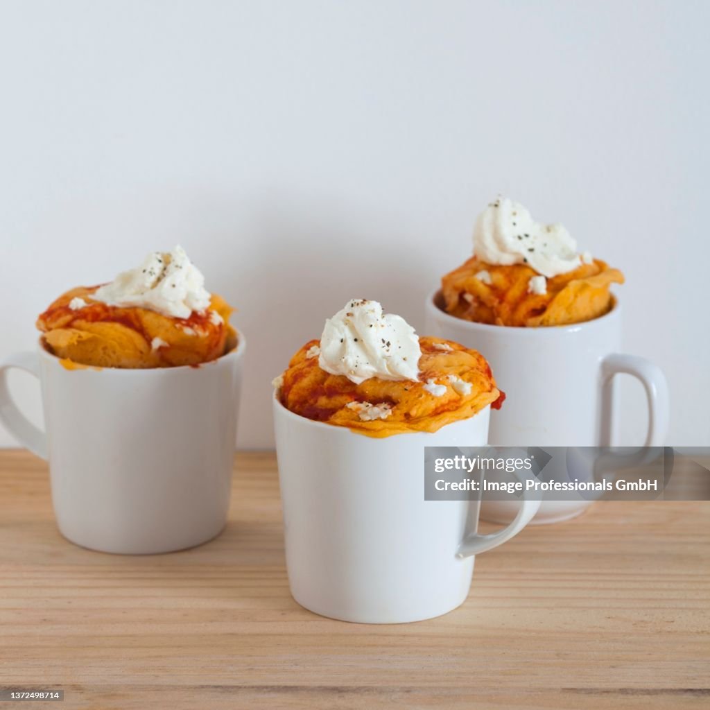 Savoury mug cakes with cream cheese and tomato sauce