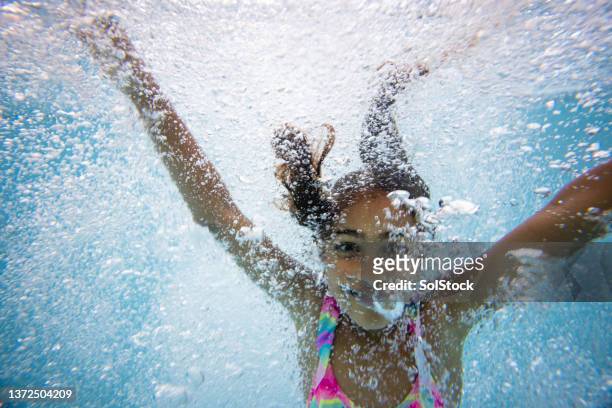 look what i can do! - pool fun stock pictures, royalty-free photos & images