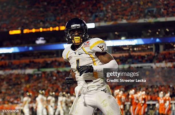 Tavon Austin of the West Virginia Mountaineers looks on after he scored a touchdown against the Clemson Tigers during the Discover Orange Bowl at Sun...