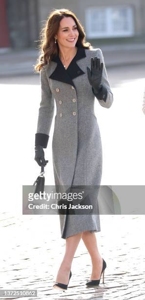 Catherine, Duchess of Cambridge waves as she accompanies Mary, Crown Princess of Denmark during a visit Christian IX's Palace on February 23, 2022 in...