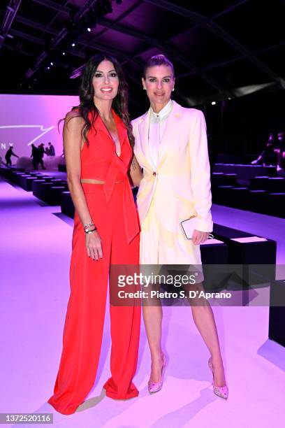 Elisabetta Gregoraci and Martina Colombari are seen on the front row of the Genny fashion show during the Milan Fashion Week Fall/Winter 2022/2023 on...