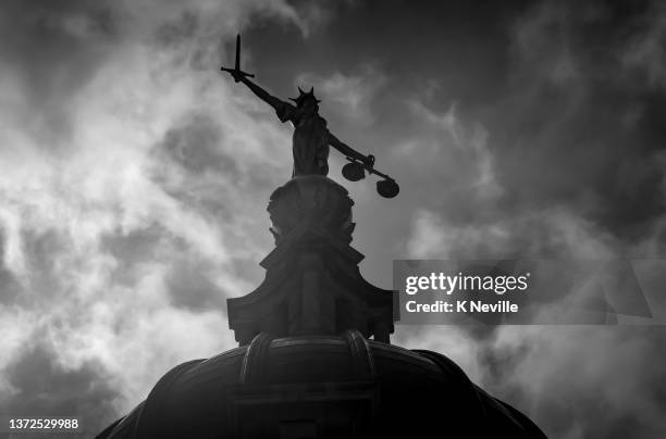 the statue of lady justice atop the old bailey - uk courtroom stock pictures, royalty-free photos & images