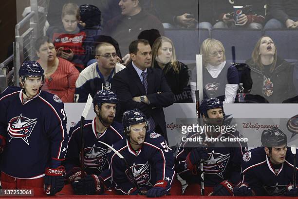 Interim Head Coach Todd Richards of the Columbus Blue Jackets watches his team on the ice during the game against the Phoenix Coyotes at Nationwide...
