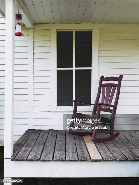 rocking chair on the porch - rocking chair stock pictures, royalty-free photos & images