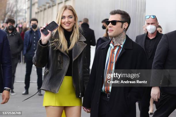 Chiara Ferragni and Fedez are seen arriving at the Prada fashion show during the Milan Fashion Week Fall/Winter 2022/2023 on February 24, 2022 in...