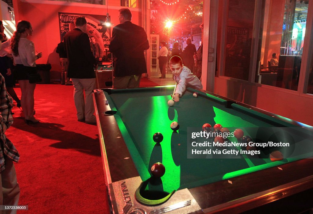 020312 Indianiapolis, IN) A section of the party was built to be like a home including pool table at The Fan Life Super Bowl party held at the Indiana State Fairgrounds in Indianapolis, IN..(Friday,February 3, 2012). Staff Photo by Nancy Lane&#