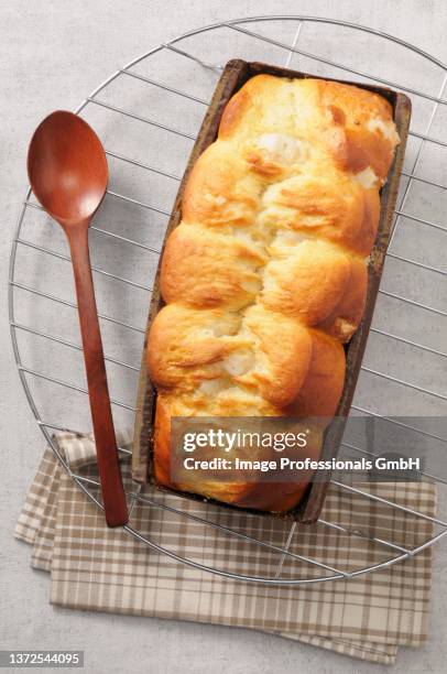 brioche in a loaf tin - braided bread stock pictures, royalty-free photos & images