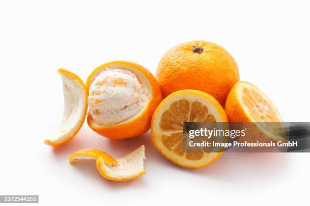 bitter oranges, whole, halved and peeled - seville orange stock pictures, royalty-free photos & images