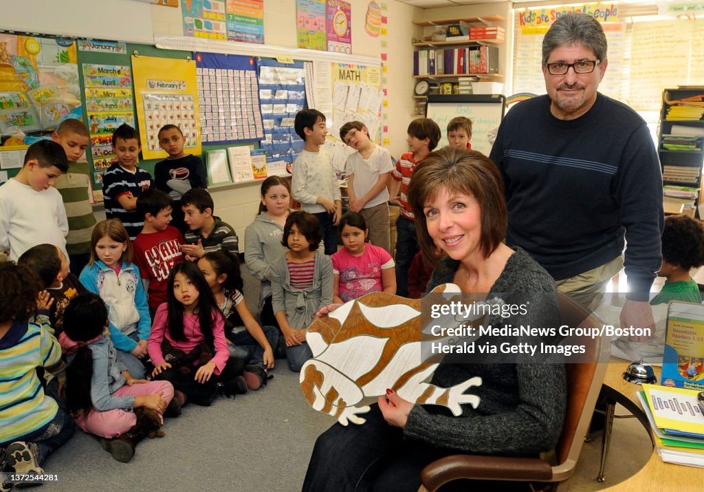 Fitchburg, MA Second grade teacher Debra Jeffries of the Crocker Elementary School in Fitchburg and her class along with State Representative Stephen DiNatale (D-Fitchburg), who filled the bill that would name the 'spring peeper' the state's off