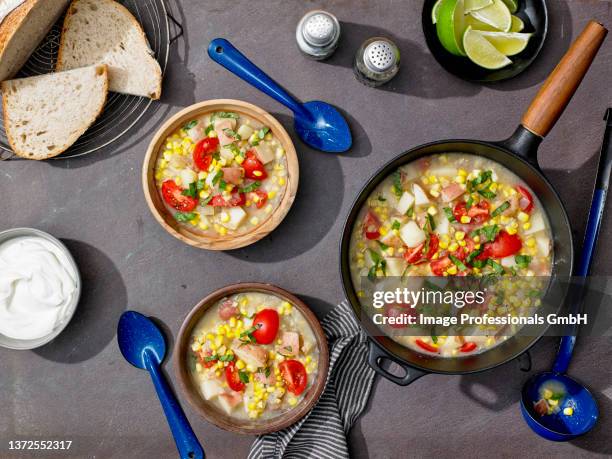 corn, tomato and basil chowder - corn chowder stock pictures, royalty-free photos & images