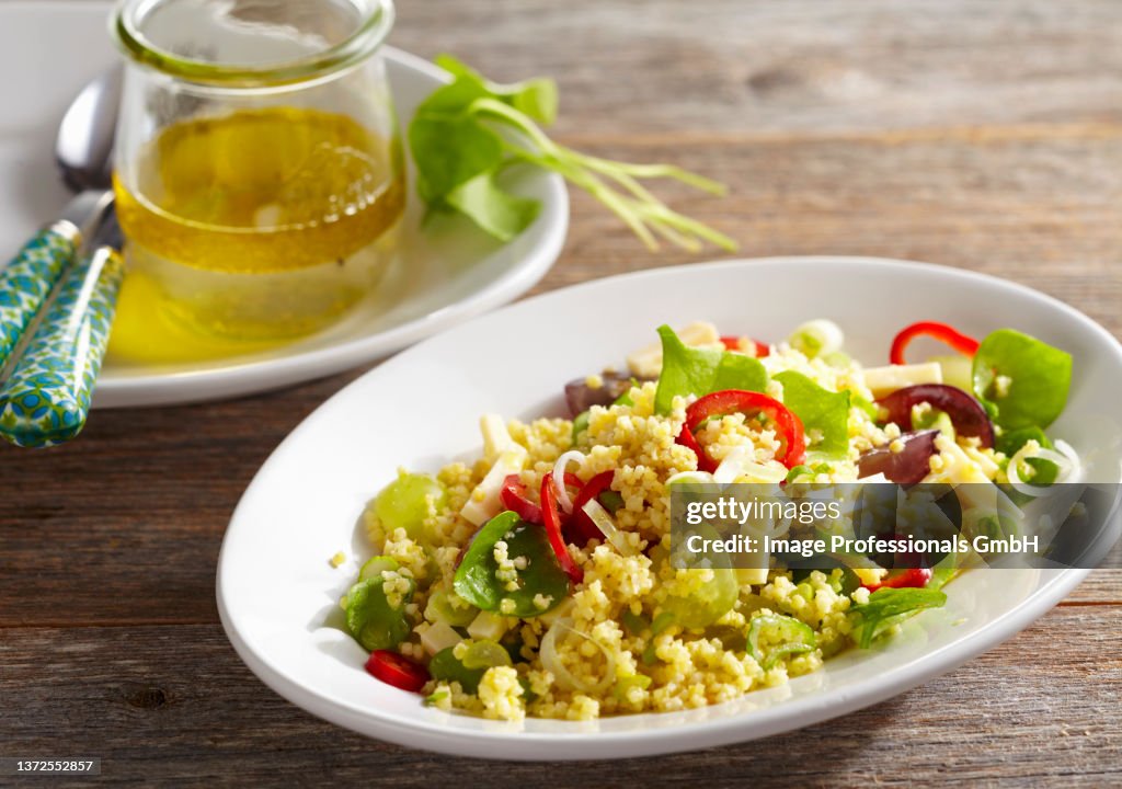 Millet salad with cheese and vegetables