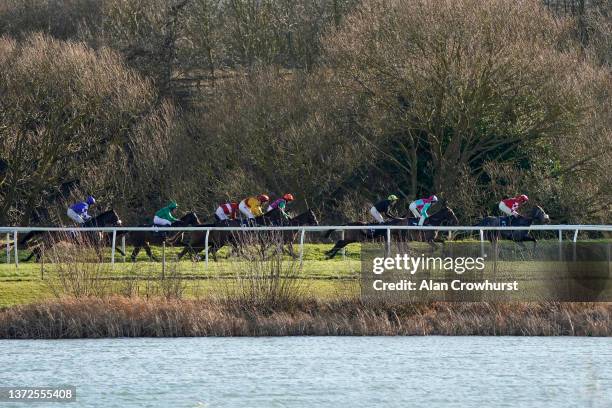 General view as runners race down the back straight during The Every Race Live On Racing TV Mares' Maiden Hurdle at Huntingdon Racecourse on February...