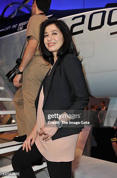 Actress Cherie Chung visits the IWC Schaffhausen booth during the 22nd SIHH High Jewellery Fair at the Palexpo Exhibition Hall on January 17, 2012 in...