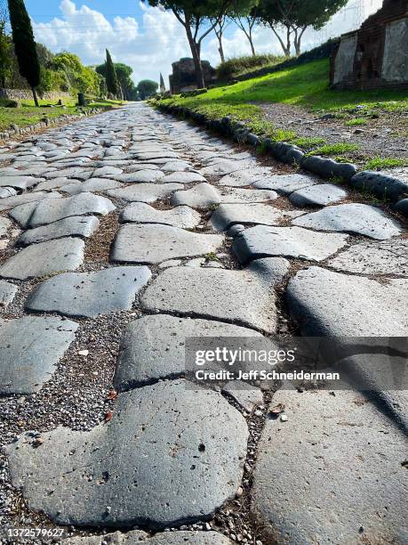 roman appia antica wagon ruts - appian way stock pictures, royalty-free photos & images