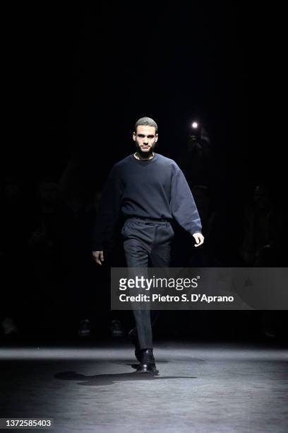 Fashion designer Nicola Brognano acknowledges the applause of the audience at the Blumarine fashion show during the Milan Fashion Week Fall/Winter...