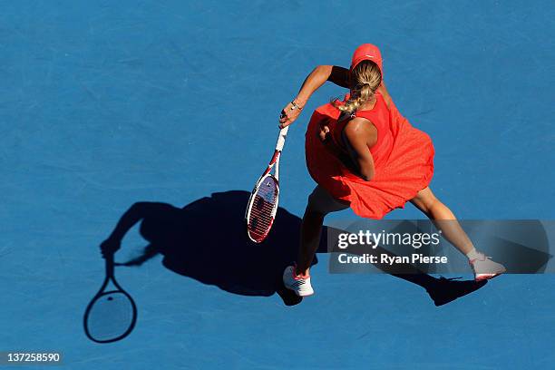 Caroline Wozniacki of Denmark plays a forehand in her second round match against Anna Tatishvili of Georgia during day three of the 2012 Australian...