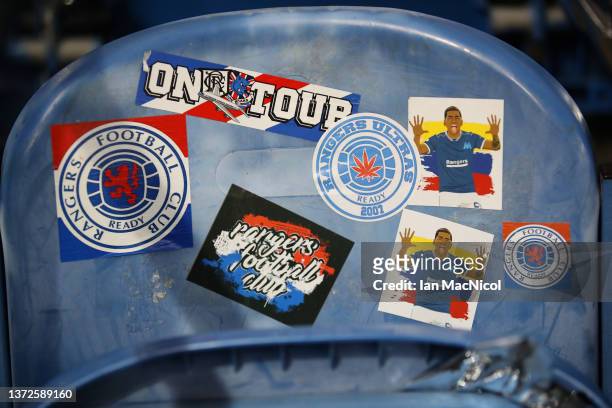 Rangers fan stickers are seen before the UEFA Europa League Knockout Round Play-Offs Leg Two match between Rangers FC and Borussia Dortmund at Ibrox...