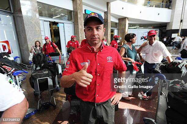 Giniel De Villiers arrives at OR Tambo International Airport where he received a hero's welcome on January 17, 2012 in Johannesburg, South Africa. De...