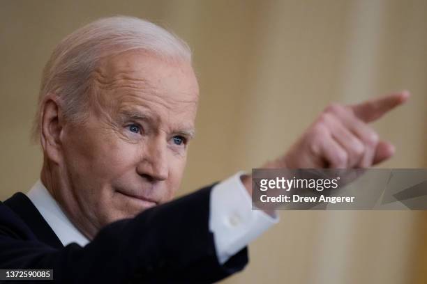 President Joe Biden answers questions after delivering remarks about Russia's “unprovoked and unjustified" military invasion of neighboring Ukraine...