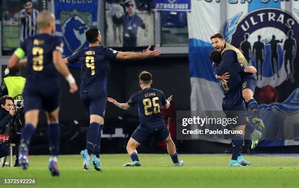 Mateus Uribe of FC Porto celebrates their sides second goal with team mates during the UEFA Europa League Knockout Round Play-Offs Leg Two match...