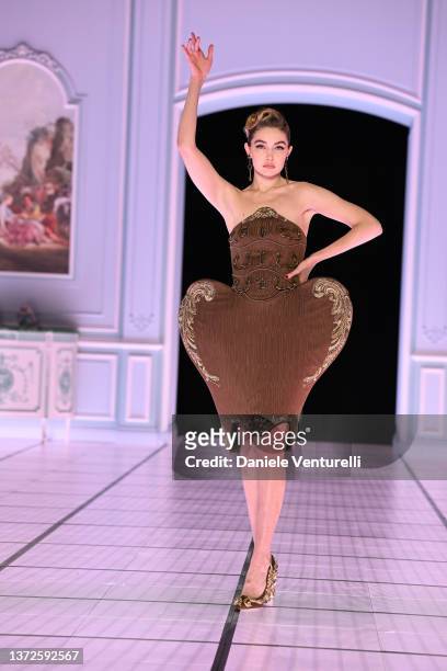 Gigi Hadid walks the runway at the Moschino fashion show during the Milan Fashion Week Fall/Winter 2022/2023 on February 24, 2022 in Milan, Italy.
