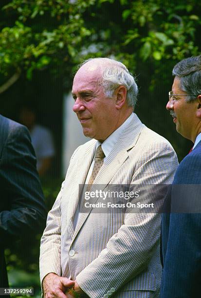 General Manager Red Auerbach of the NBA Champions Boston Celtic and NBA Commissioner David Stern looks on circa 1981 at the White House in...