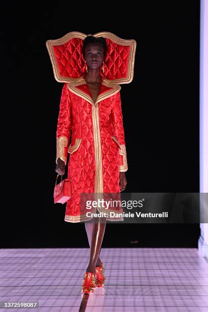 Model walks the runway at the Moschino fashion show during the Milan Fashion Week Fall/Winter 2022/2023 on February 24, 2022 in Milan, Italy.