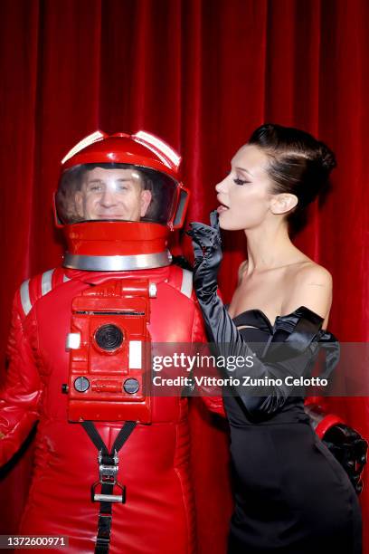 Designer Jeremy Scott and Bella Hadid pose backstage of the Moschino fashion show during the Milan Fashion Week Fall/Winter 2022/2023 on February 24,...