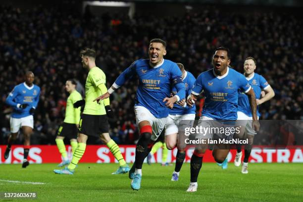 James Tavernier of Rangers celebrates scoring to make it 1-0 during the UEFA Europa League Knockout Round Play-Offs Leg Two match between Rangers FC...