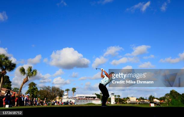 Rickie Fowler plays his shot from the 15th tee during the first round of The Honda Classic at PGA National Resort And Spa on February 24, 2022 in...