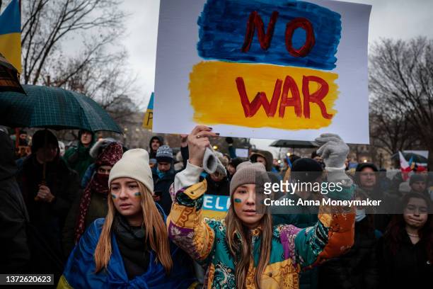 Anti-war demonstrators and Ukrainians living in the U.S. Protest against Russia's military operation in Ukraine in Lafayette Park on February 24,...