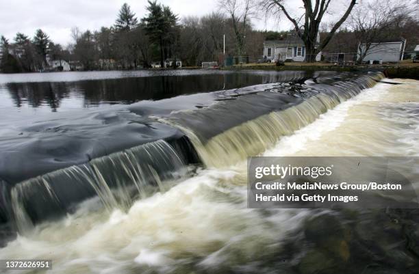 After a close call which had residents sandbagging their backyards and setting up sump pumps in their basements, water levels are finally going down...