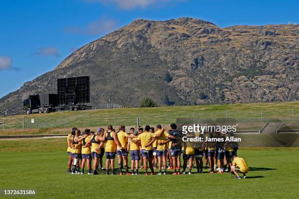 Hurricanes team huddle during the Hurricanes captains run at the John Davies Oval fields on February 25, 2022 in Queenstown, New Zealand.
