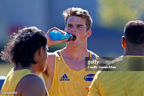 Hurricanes player Justin Sangster takes a drink break during the Hurricanes captains run at the John Davies Oval fields on February 25, 2022 in...