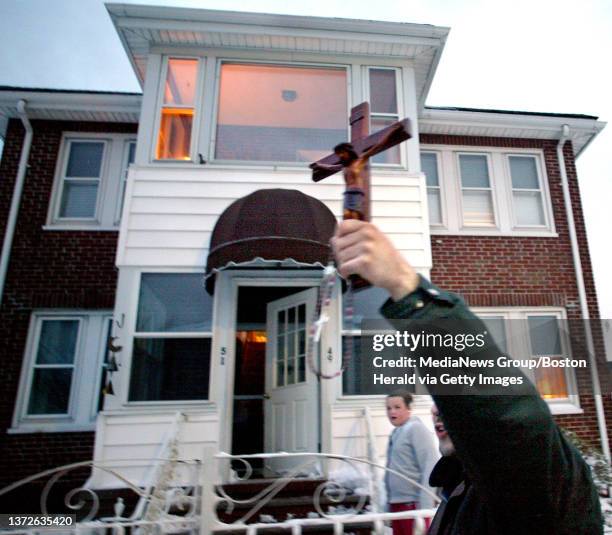 Protest against Stem Cell research in front of the home of Speaker of the House Robert Travaglini's home. Mark Foudy of Boston walks in front of the...