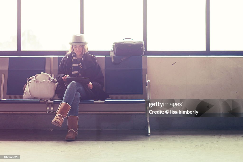 Young woman waiting in airport