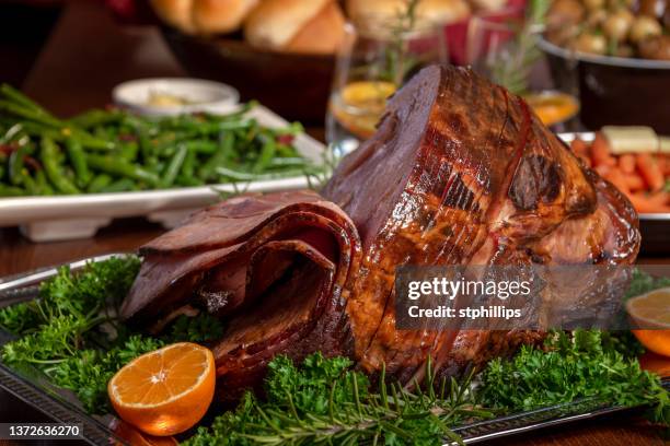 glazed spiral cut easter ham dinner - glazed ham stock pictures, royalty-free photos & images