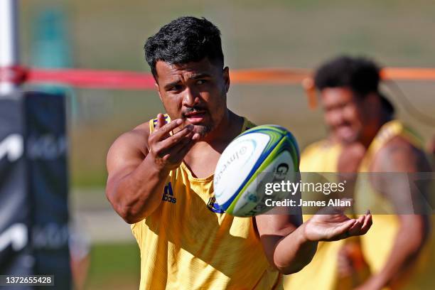 Hurricanes player Siua Maile passes the ball during the Hurricanes captains run at the John Davies Oval fields on February 25, 2022 in Queenstown,...