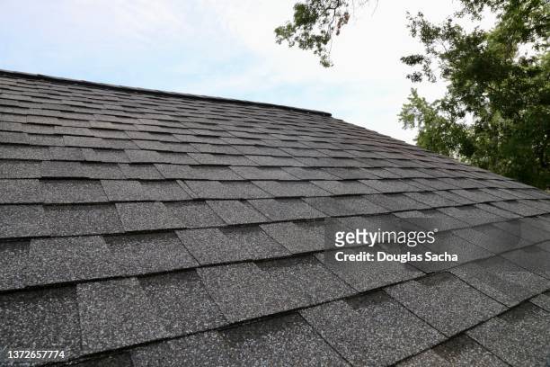 tab styled roof shingles - roof tiles stock pictures, royalty-free photos & images