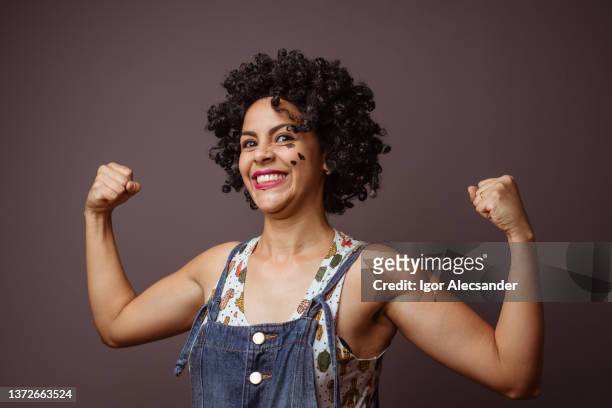 girl power - theater artist - afro wig stock pictures, royalty-free photos & images
