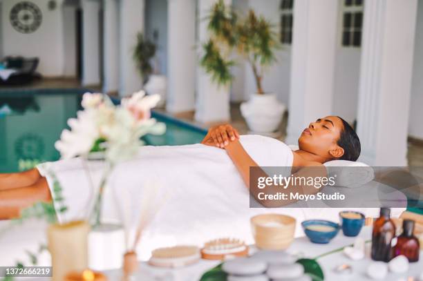 shot of an attractive young woman getting a beauty treatment at a spa - aromatherapy stock pictures, royalty-free photos & images