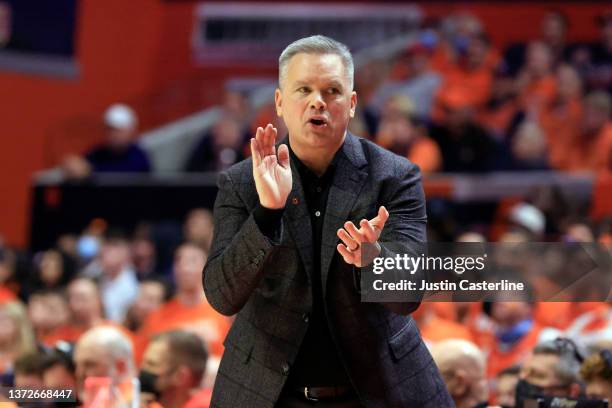 Head coach Chris Holtmann of the Ohio State Buckeyes reacts after a play against the Illinois Fighting Illini at State Farm Center on February 24,...