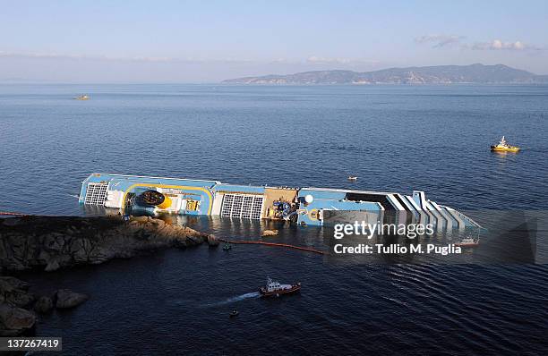 General view of cruise ship Costa Concordia on January 18, 2012 in Giglio Porto, Italy. The official death toll is now 11, with a further 24 people...
