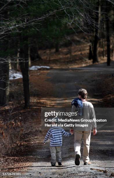 Sunday, Maple Sugaring Days at Brookwood Farms in the Blue HIlls. Harrison Gabriele, 5 of Braintree, walks around the farm with his dad, Paul. March...