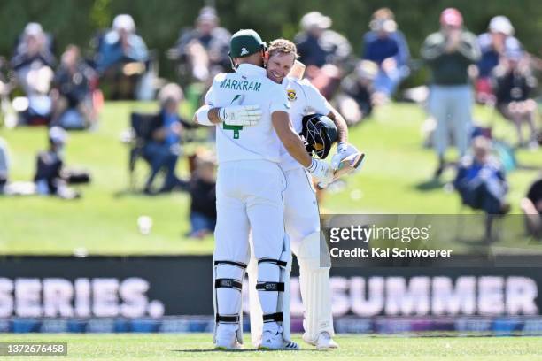 Sarel Erwee of South Africa is congratulated by Aiden Markram of South Africa after scoring a century during day one of the Second Test Match in the...