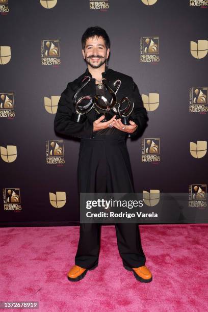 Camilo poses with awards during Univision's 34th Edition Of Premio Lo Nuestro a la Música Latina at FTX Arena on February 24, 2022 in Miami, Florida.