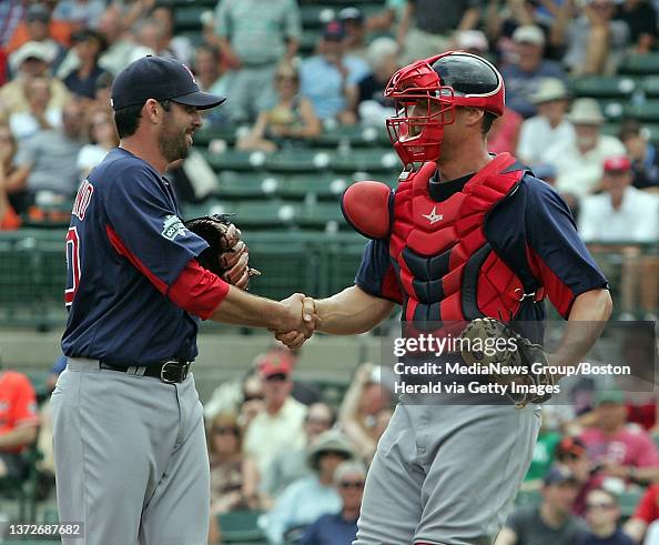Justin German Shell Boston Red Sox starting pitcher Justin Germano is congratulated on ...