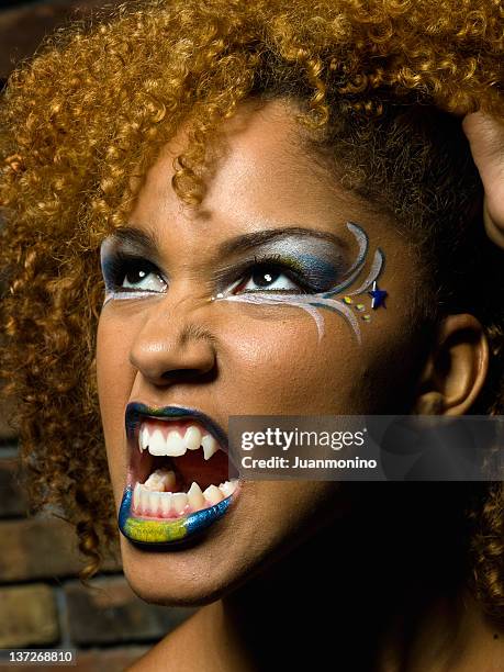 young vampire - eye liner stock pictures, royalty-free photos & images