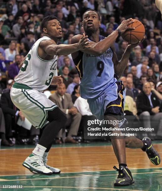 Memphis Grizzlies forward Tony Allen drives past Boston Celtics guard Marcus Smart in the fourth quarter of the NBA game at the TD Garden on...